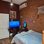 Rooms In A Luxurious Colonial Townhouse