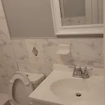 In A House With Queen Bed In A Landlord Hosted Three Bedroom Homestay