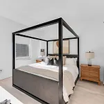 Lavish Two-Story Retreat In The Heart Of Manhattan