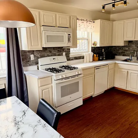 Large 3-bedrooms/2-bath Apt, One Block To Train