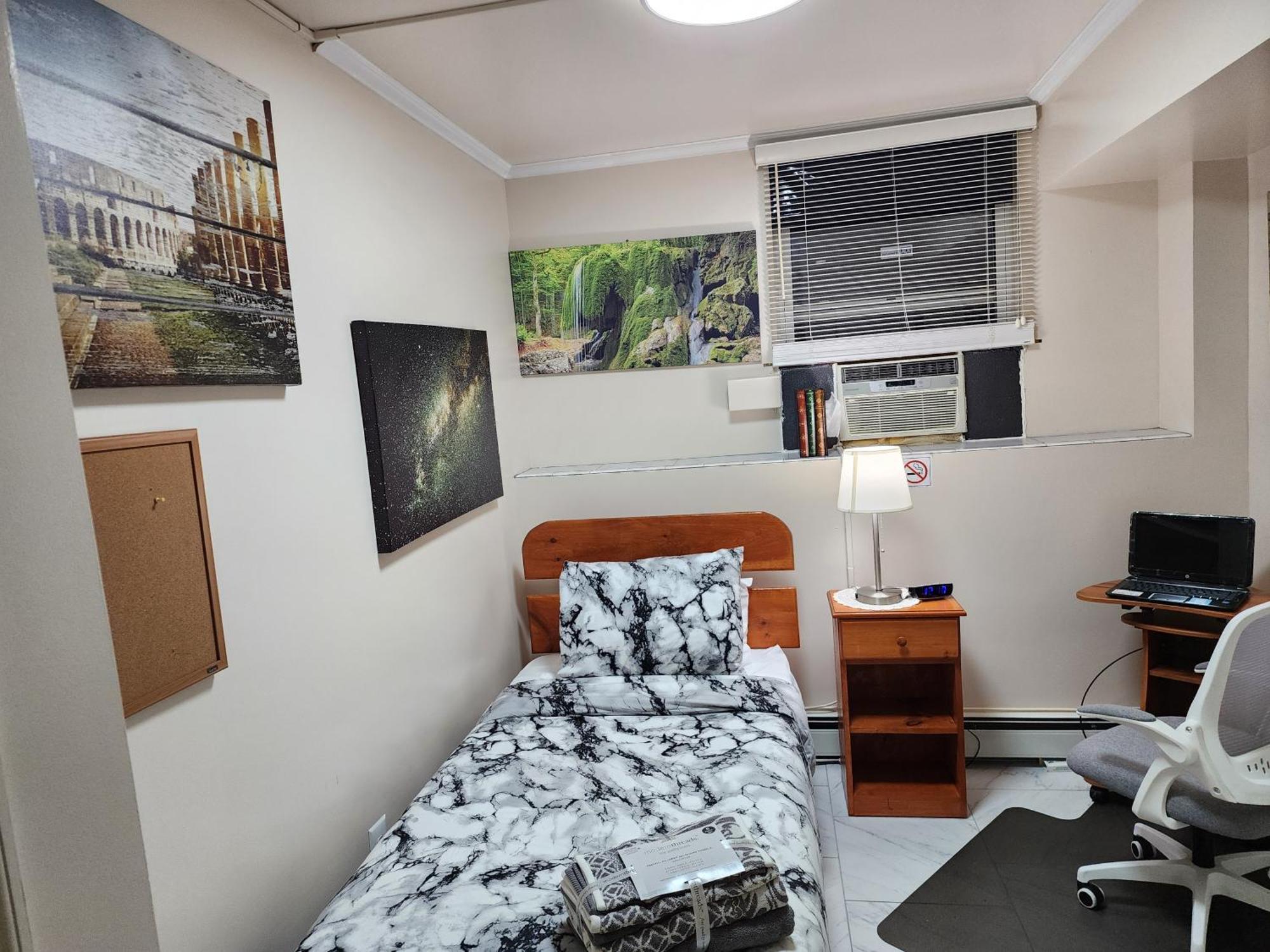 Two-bedroom Serviced Apartment: High-speed Wi-fi & Bi-monthly Housekeeping