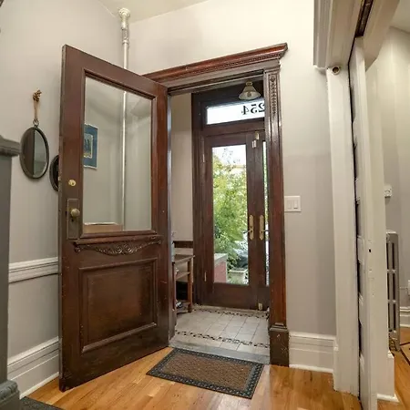 A Charming 4 Bd Garden Oasis Brick Townhouse Apartment